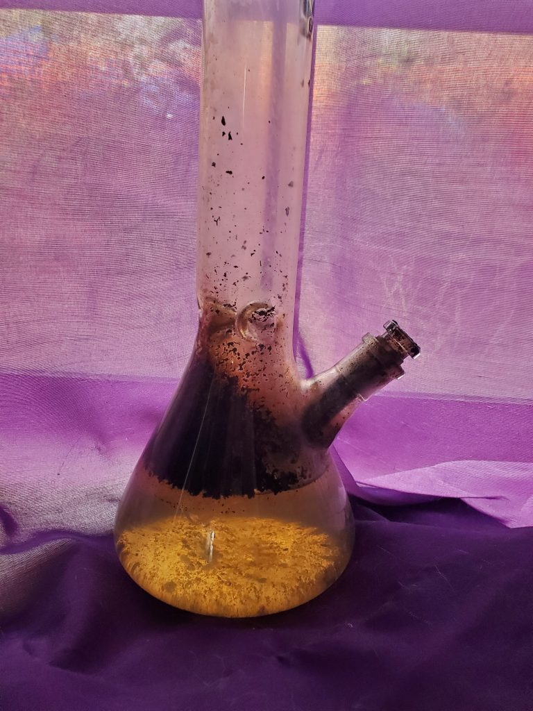 Dirty bong with dirty bong water