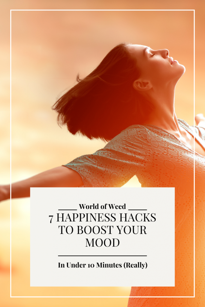 Image of woman with arms spread out, head tilted toward the sun, is overlaid with a white box with black text that reads 7 Happiness Hacks to Boost Your Mood in Under 10 Minutes